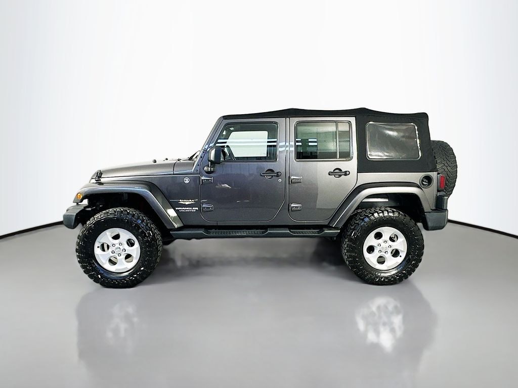 Used 2014 Jeep Wrangler Unlimited Sahara Sport Utility