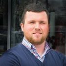 Staff member John Lee from f1c865ccd04b