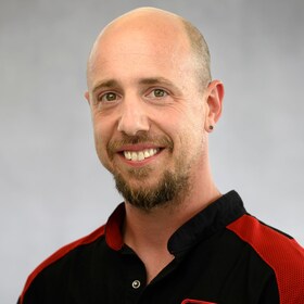 Staff member Justin Szmak from ID_1f3df4