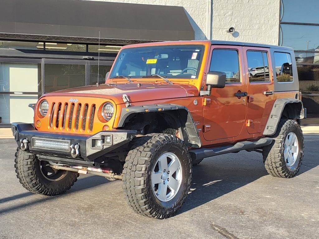 Used 2010 Jeep Wrangler Unlimited Sahara with VIN 1J4BA5H17AL185898 for sale in Florence, KY