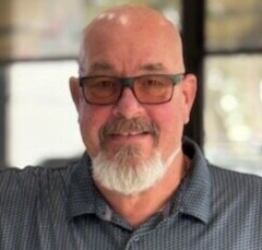 Staff member John Kennedy from fccc52335769