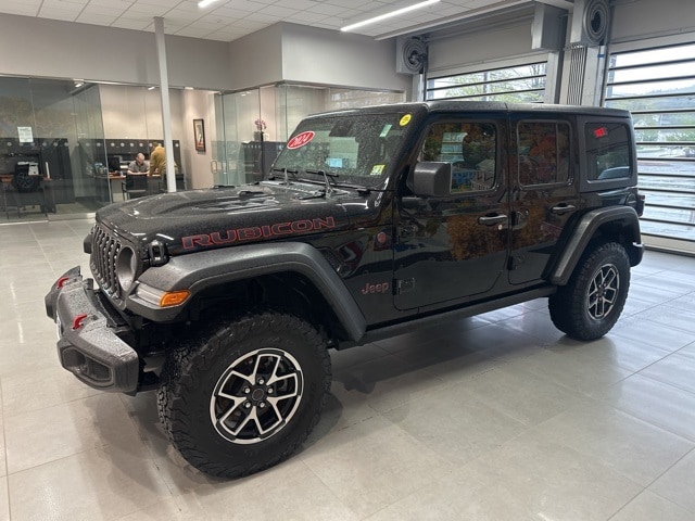 Used 2024 Jeep Wrangler 4-Door Rubicon with VIN 1C4PJXFGXRW300809 for sale in Rochester, NH