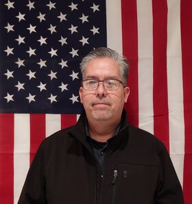 Staff member Manny Aguirre from ID_69e0ec