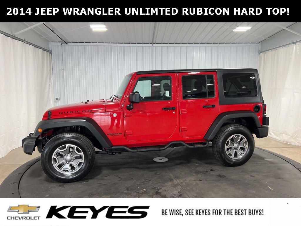 Used 2014 Jeep Wrangler Unlimited Rubicon with VIN 1C4BJWFGXEL221477 for sale in Menomonie, WI