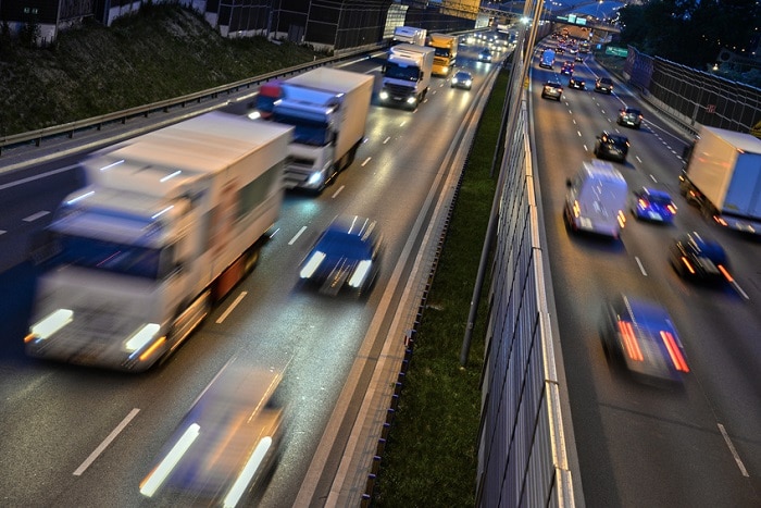 Cars_Driving_On_Highway.jpg