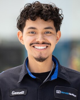 Staff member Garrett Garay from d1b7614ec264