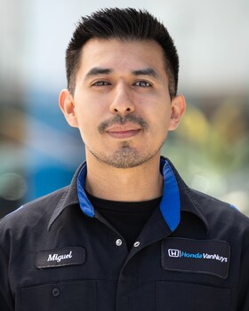 Staff member Miguel Rodriguez from d1b7614ec264