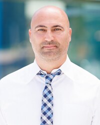 Staff member Ron Khayat from fa7918d00c0f