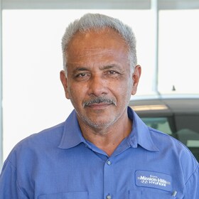 Staff member Carlos Pineda from ID_52f257eee77d
