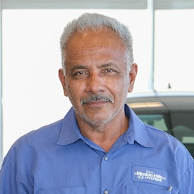 Staff member Carlos Pineda from ID_52f257eee77d
