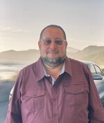 Staff member Izzy Medina  from ID_2c8850