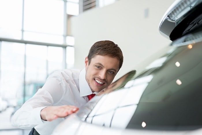 Salesman_Inspecting_Car.jpg