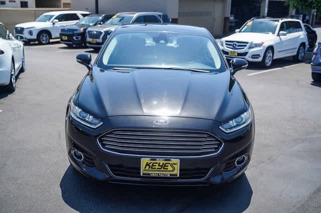 Used 2014 Ford Fusion Titanium with VIN 3FA6P0RU8ER129452 for sale in Van Nuys, CA