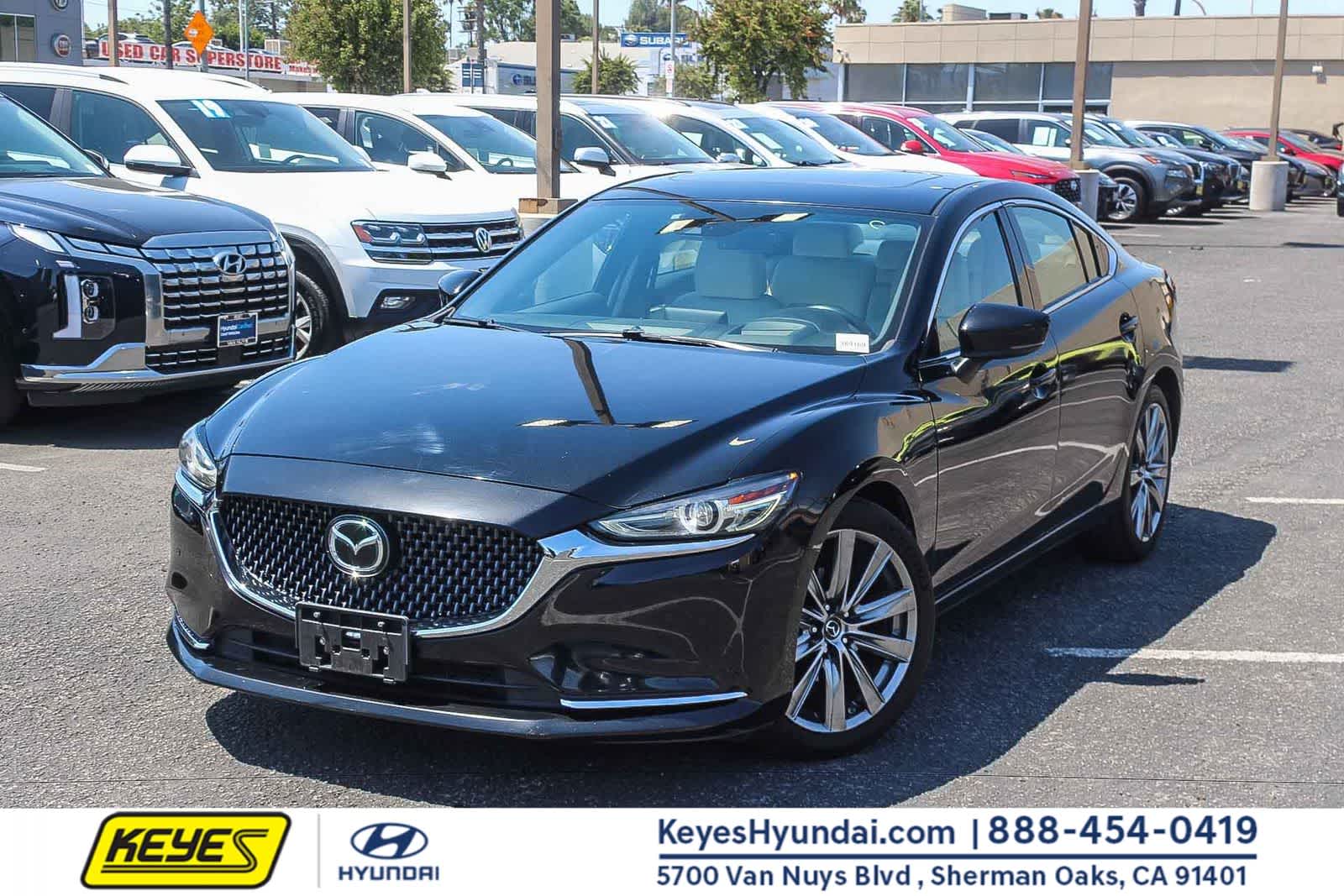 2018 Mazda EZ-6 Signature Auto's photo