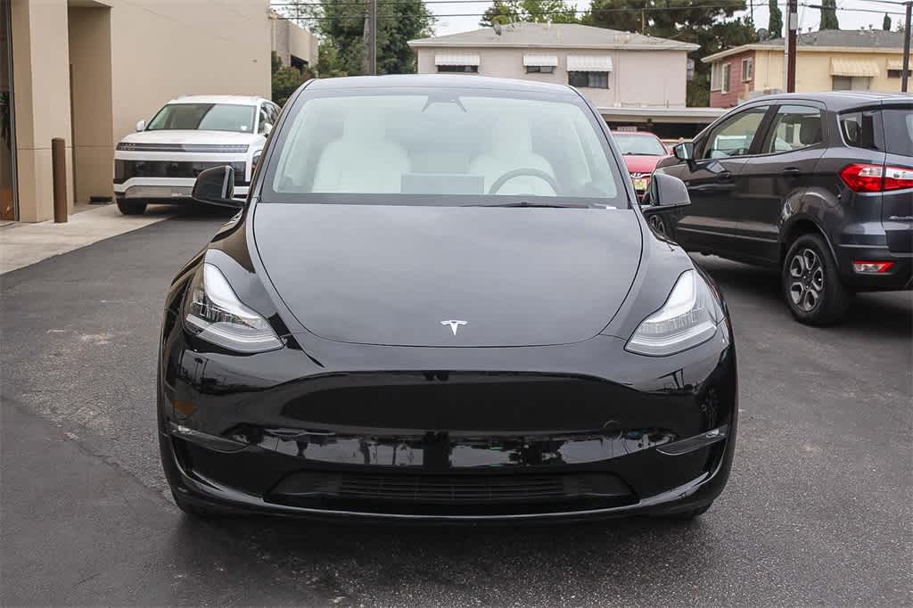 Used 2021 Tesla Model Y Standard Range with VIN 5YJYGDED1MF107275 for sale in Northfield, Minnesota
