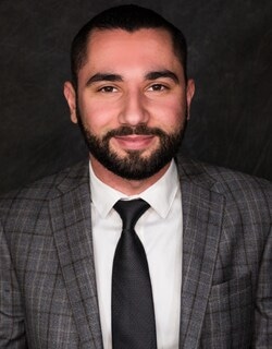 Staff member Jimmy Amour from ID_604910480149