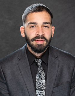 Staff member Ali Saleh from ID_ddd10075cdbe