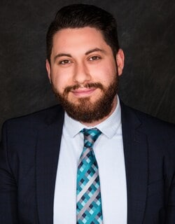 Staff member John Saado from ID_604910480149