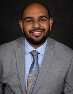 Staff member Justin Samaan from ID_7b4c86aa5049