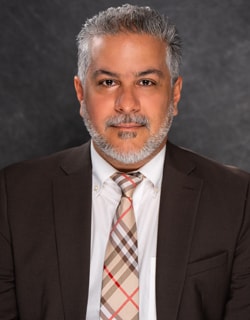 Staff member Sam Kalbassi from ID_e32cecdf8337