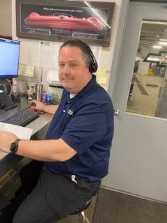 Staff member Christopher Cobb from ID_a44756