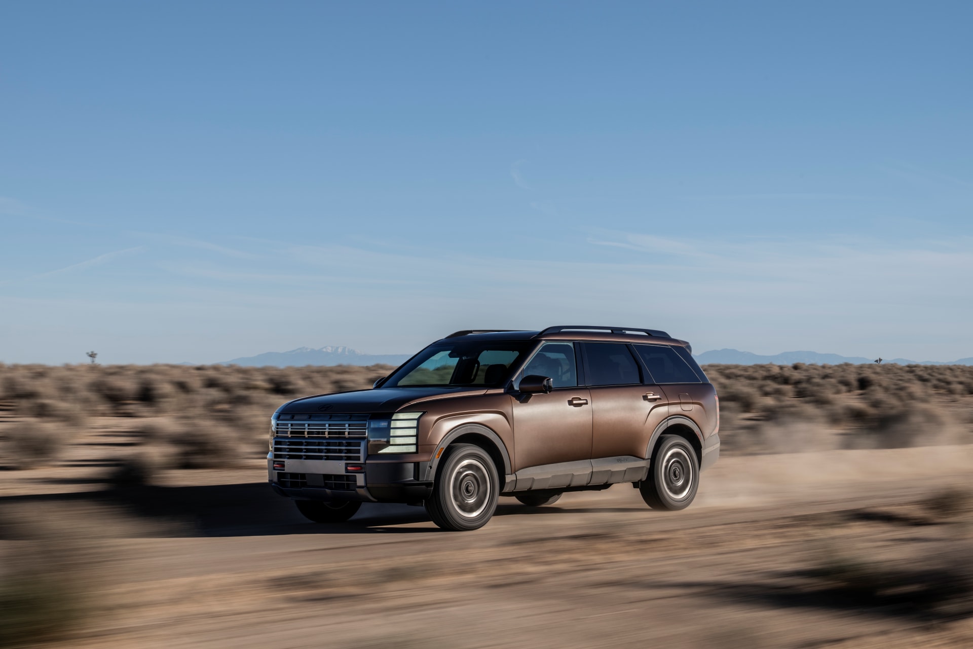 2026-Hyundai-Palisade-driving-on-dirt-road-in-desert.png