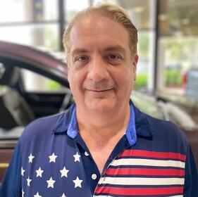 Staff member Chris Wilson from 4d77c227afa0