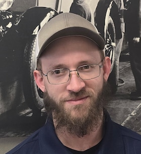 Staff member Aaron Ide  from ID_79441e