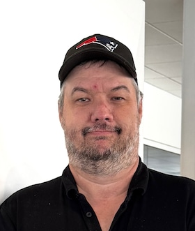 Staff member Chris Fecteau from ID_ec2fd36c0659