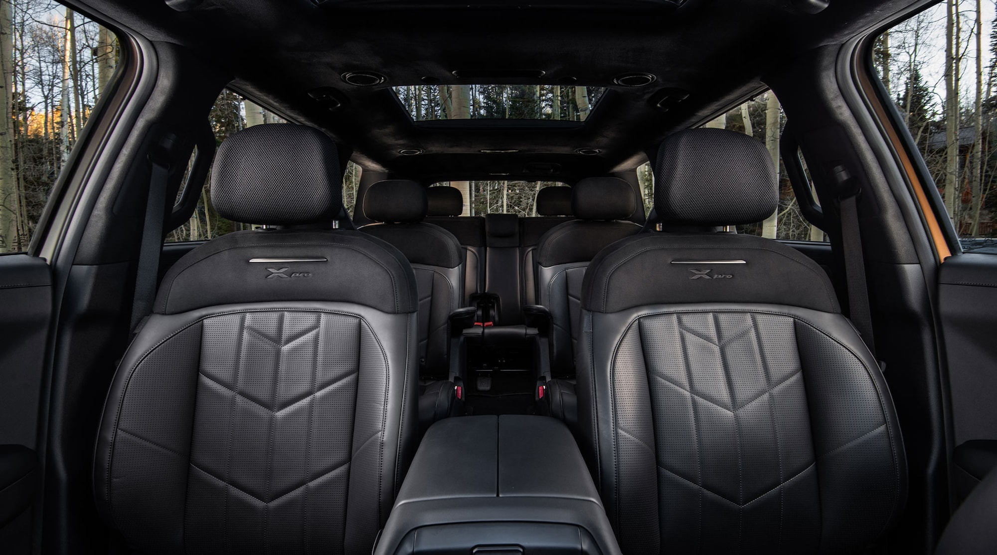 X-Pro SX Prestige shown with 7-passenger seating configuration & dual sunroofs.
