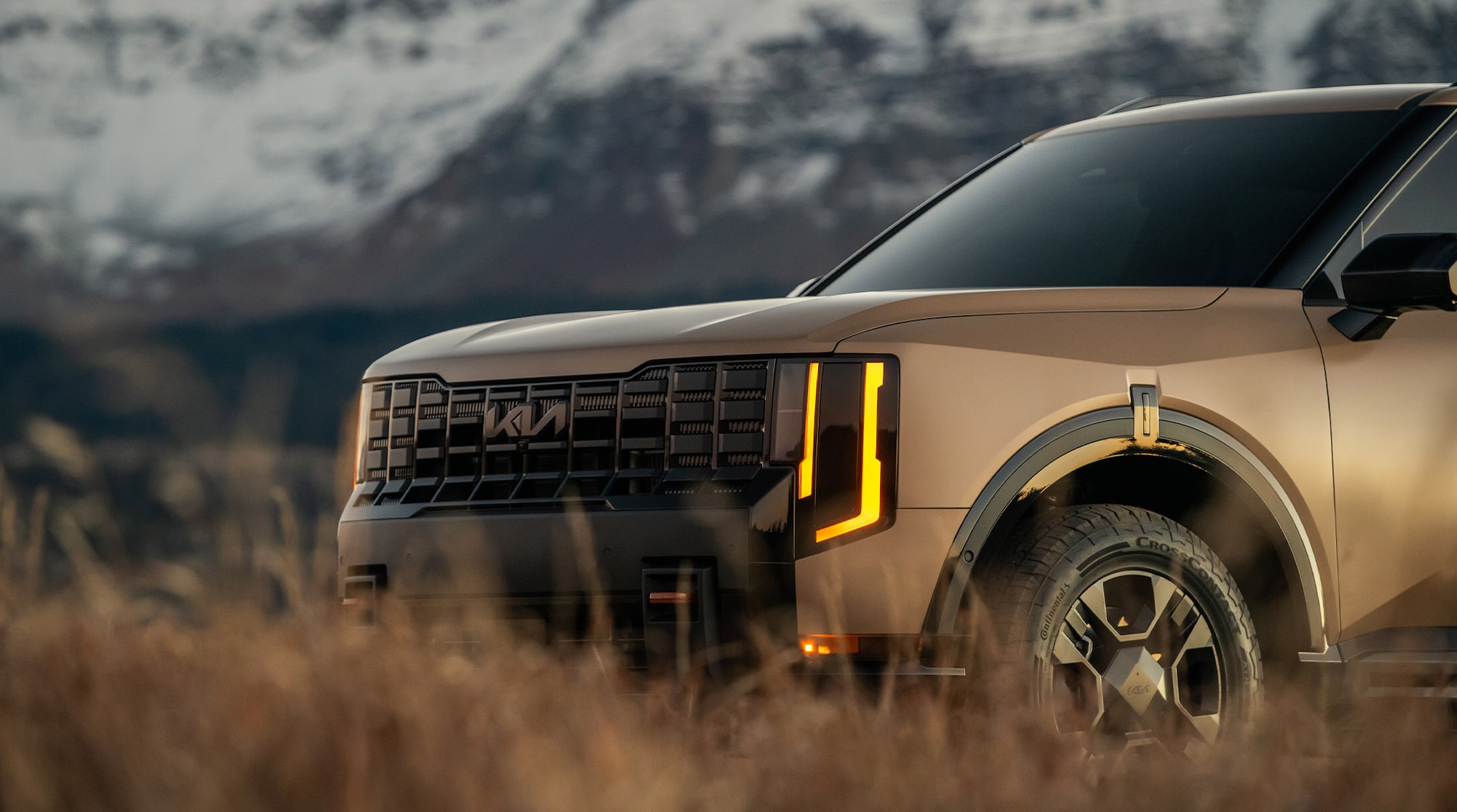X-Pro SX Prestige shown in Terrain Brown Matte with a matte black insert and gloss black surround front grille.