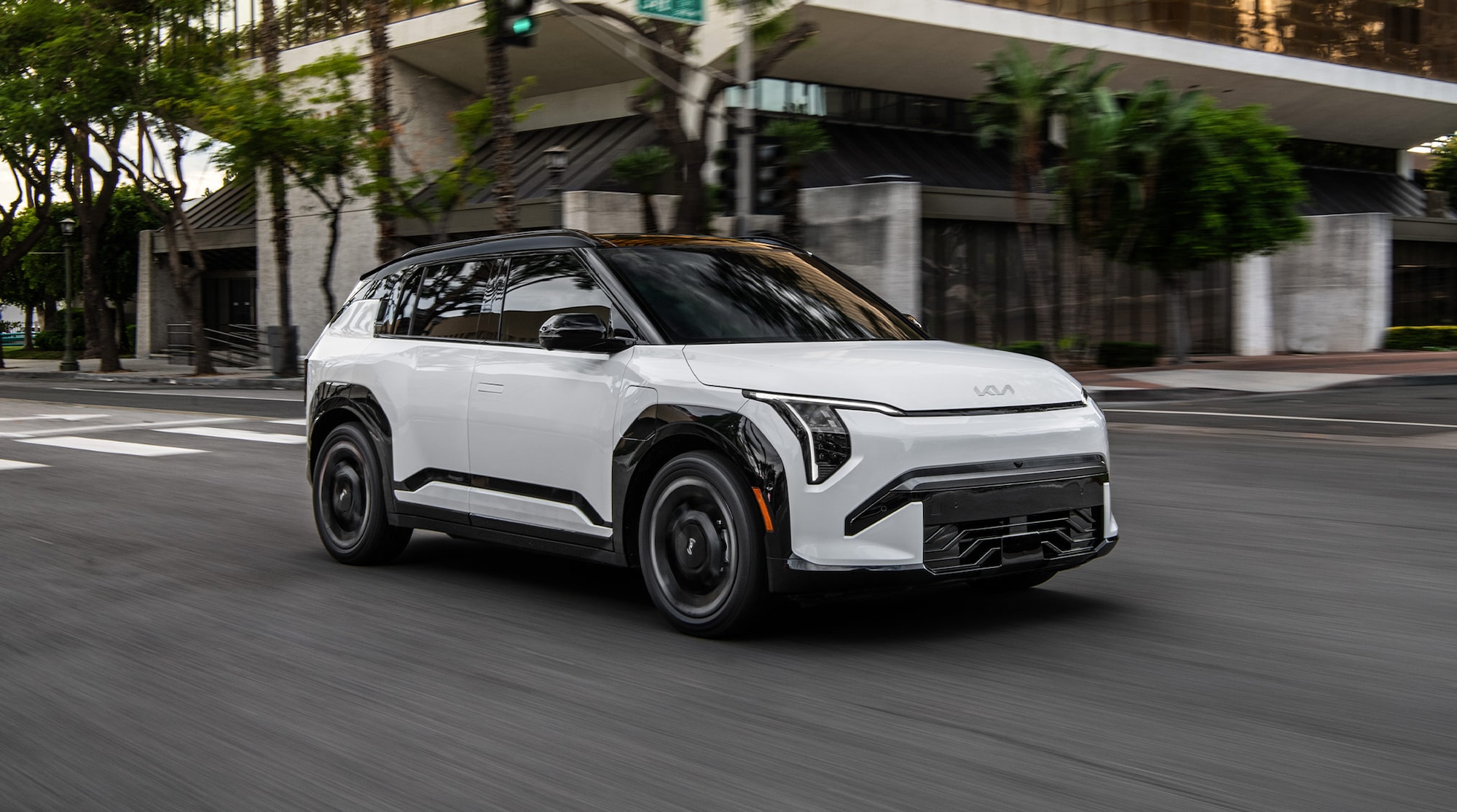 GT-Line shown in Snow White Pearl with gloss black wheel arch molding.