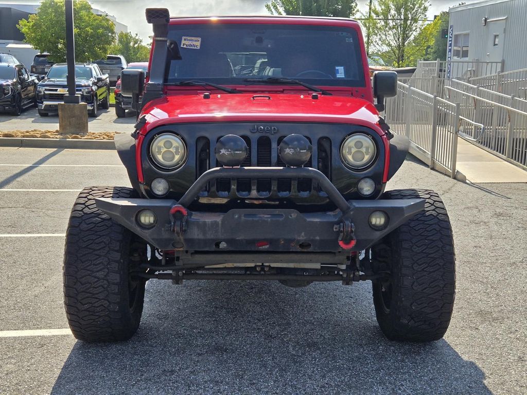 Used 2015 Jeep Wrangler Unlimited Sport with VIN 1C4BJWDG7FL522390 for sale in Columbus, GA