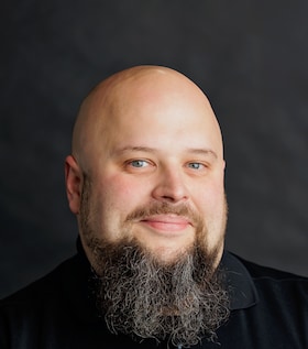 Staff member Randy Cruse from ID_86a72e86cb4b
