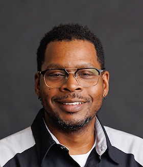 Staff member Ro McNeal from ID_86a72e86cb4b
