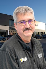 Staff member Randy Mallo from ID_0d9be9218da4