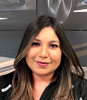 Staff member Julie Romero from 270eebdc5a4c