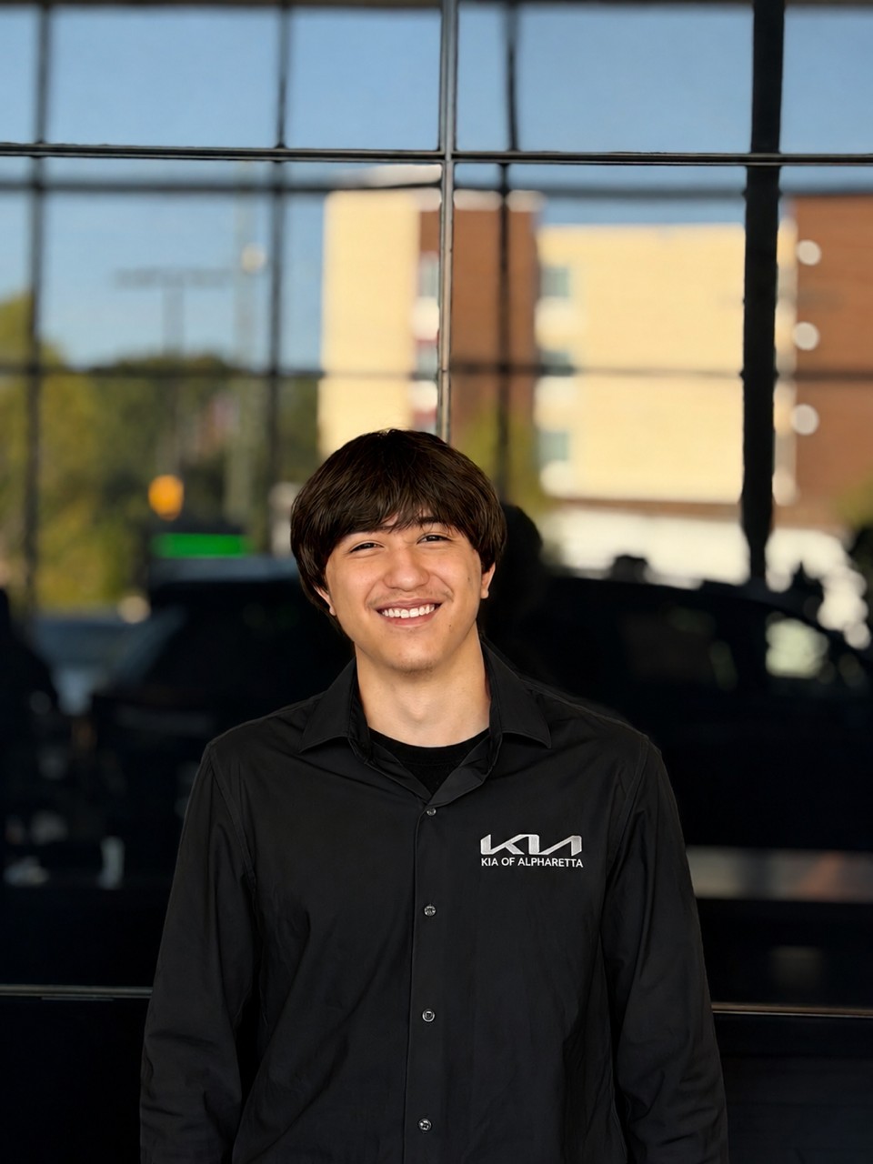 Staff member Aaron Machado from ID_1f9545