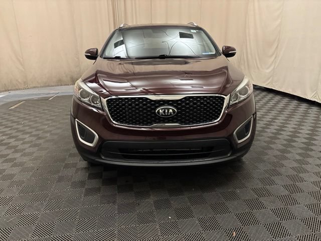 Used 2016 Kia Sorento LX with VIN 5XYPG4A3XGG128227 for sale in Bedford, OH