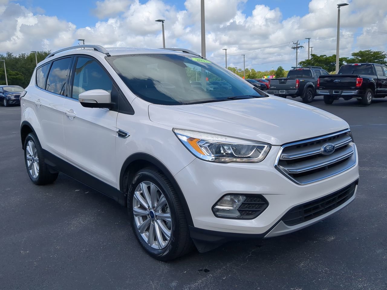 Used 2017 Ford Escape Titanium with VIN 1FMCU0JD8HUD24882 for sale in Cape Coral, FL