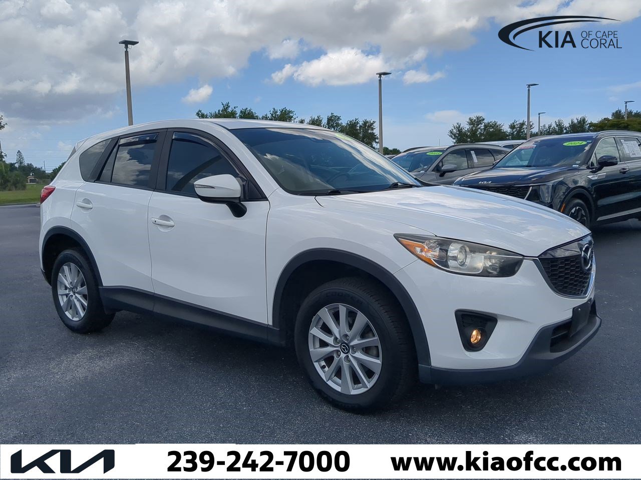 Used 2015 Mazda CX-5 Touring with VIN JM3KE2CY8F0509972 for sale in Cape Coral, FL