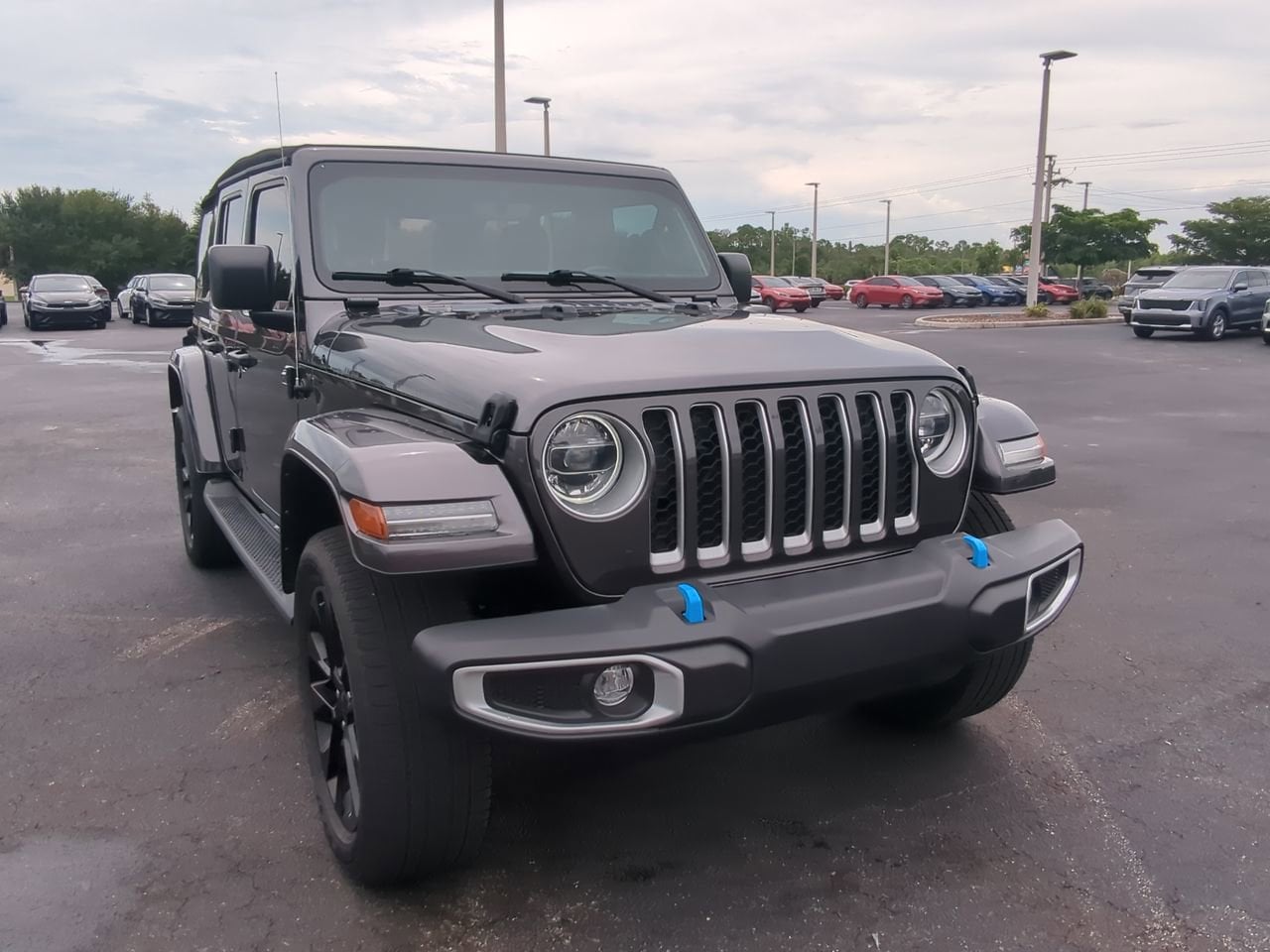 Used 2022 Jeep Wrangler Unlimited Sahara 4XE with VIN 1C4JJXP6XNW278719 for sale in Cape Coral, FL