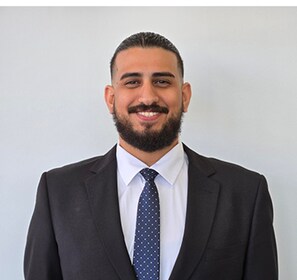 Staff member Joseph Hanna from ID_0d8905