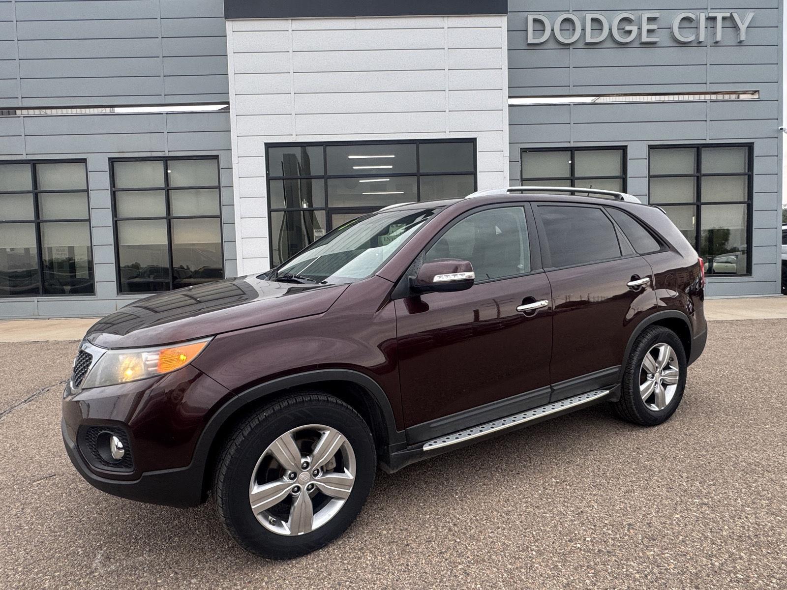 Used 2013 Kia Sorento EX with VIN 5XYKU4A66DG352877 for sale in Dodge City, KS