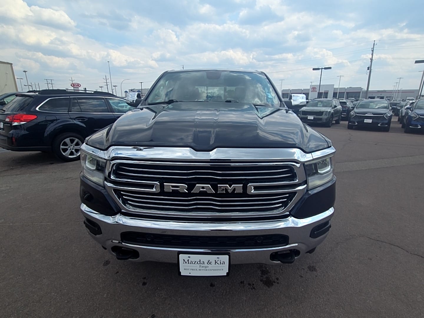 Used 2020 RAM Ram 1500 Pickup Laramie with VIN 1C6SRFJT6LN177323 for sale in Fargo, ND