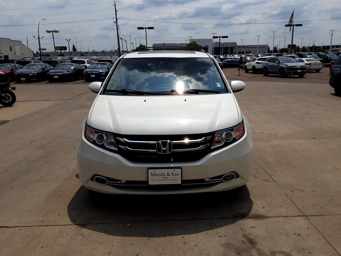 Used 2016 Honda Odyssey Touring with VIN 5FNRL5H9XGB020590 for sale in Fargo, ND