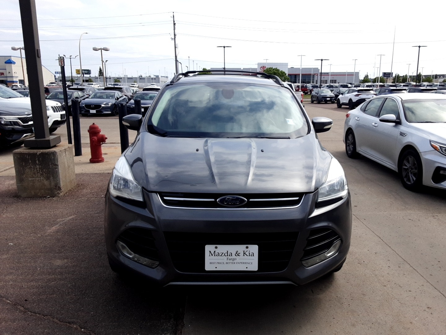 Used 2013 Ford Escape SEL with VIN 1FMCU9HX6DUA93785 for sale in Fargo, ND