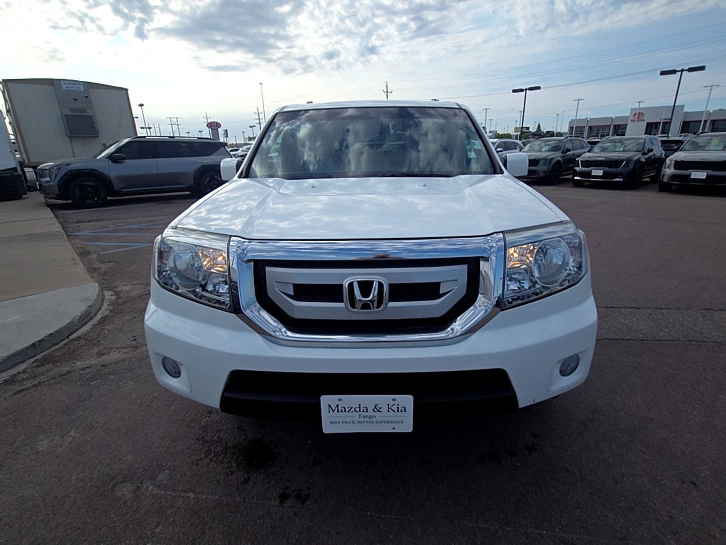 Used 2009 Honda Pilot EX-L with VIN 5FNYF48529B048221 for sale in Fargo, ND