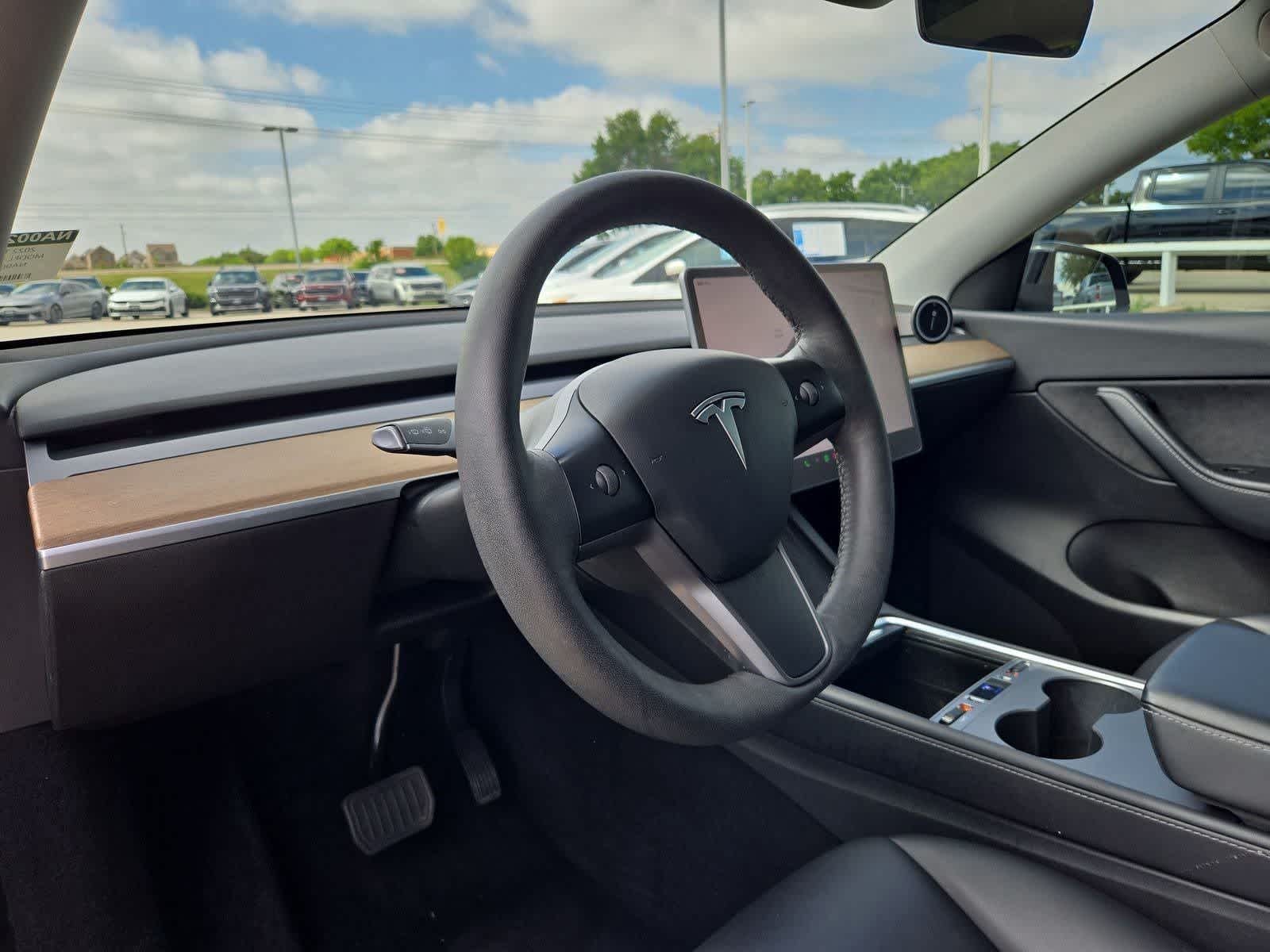 Used 2022 Tesla Model Y Long Range with VIN 7SAYGDEE0NA002138 for sale in Frisco, TX