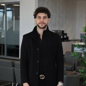 Staff member AJ Alajami from ID_fd11a630bc75